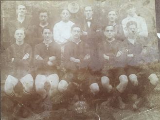 Brady Club 1913 - sitting second left