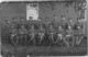 Morris (far left) with a group of unknown soldiers
