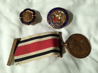 Jack's medal and badges - City of Manchester Special Constables badge, Manchester Volunteer Defense Corps badge, Special Constabulary Long Service Medal with Great War clasp
