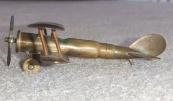 Model plane made from shell casings in the trenches