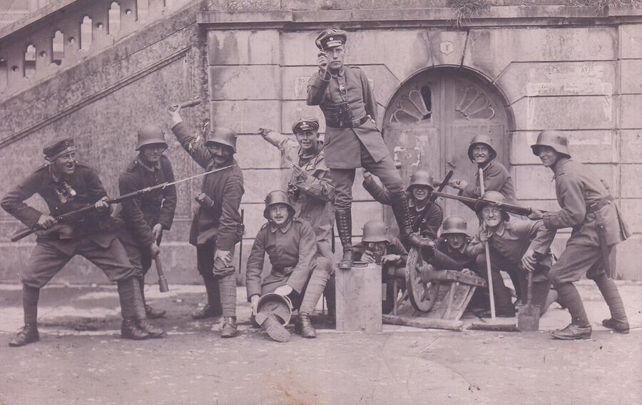 With his battalion (Alex is in the middle, standing on the block).