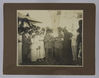 Mounted photograph of a group of men and women, some men in uniform. ©Jewish Museum London/Jewish Military Museum