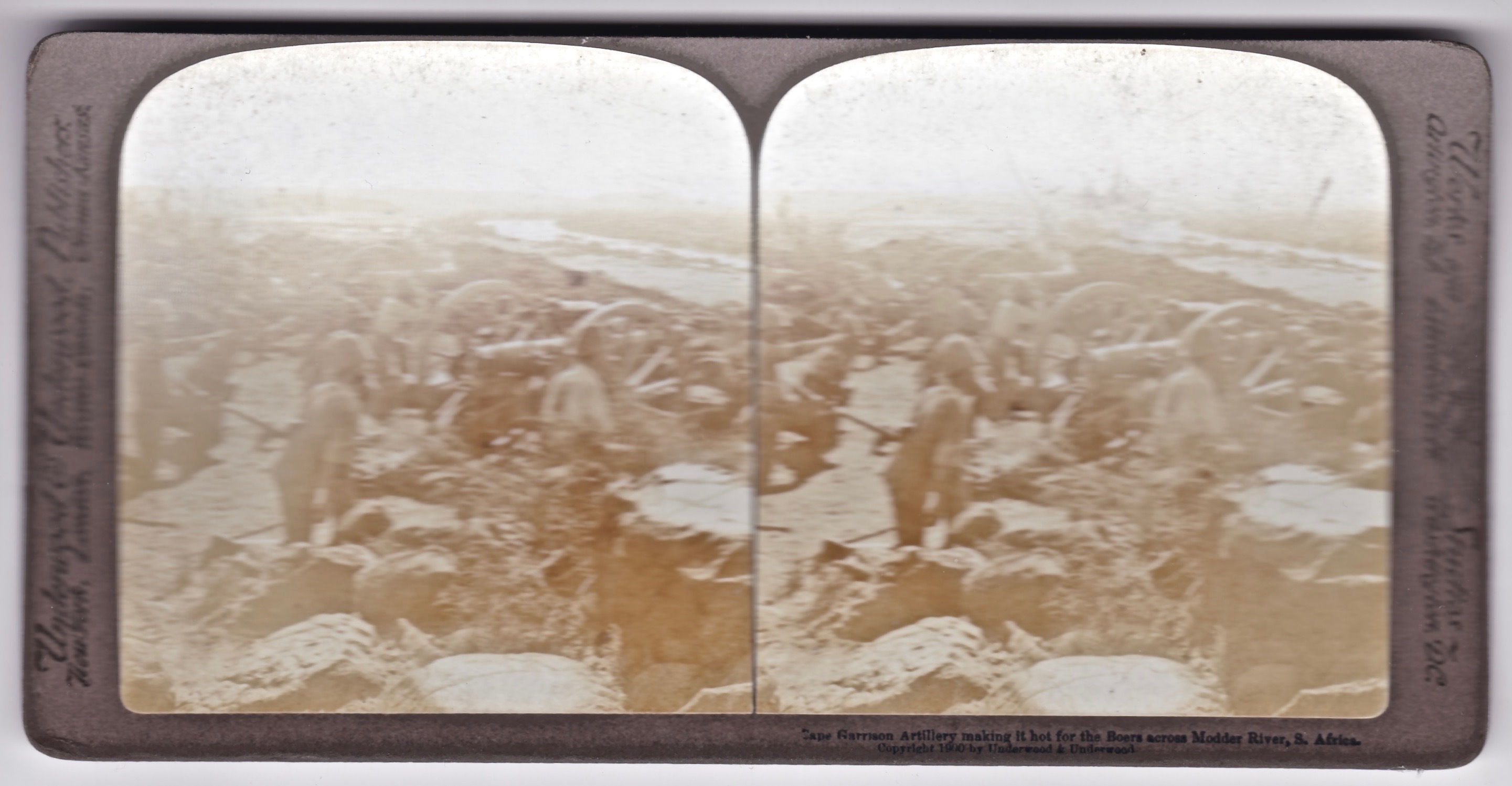 Cape Garrison artillery making it hot for the Boers across the Modder River, South Africa