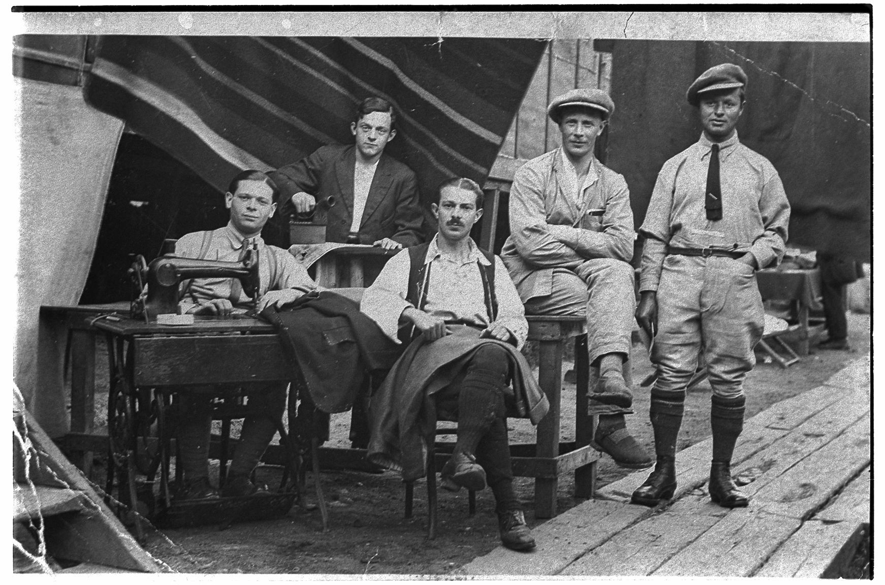 Joseph Prepsler seated at a sewing machine at an Isle of Man internment camp (Manchester Jewish Museum)