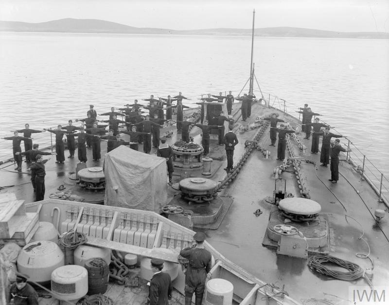 Royal Marines and bluejackets at physical drill on the forecastle of HMS Royal Oak. 1916. © IWM (Q 17974)