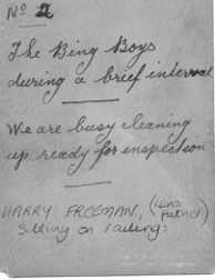 Back of photograph - "The Bing Boys during a brief interval. We are busy cleaning up ready for inspection."