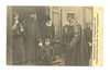 German soldier discussing the war news with a family