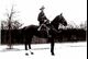 Charles Oppenheimer on horseback 