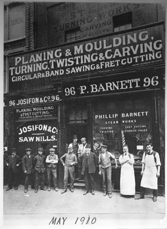 Photograph of Phillip Barnett outside his cabinet making shop at 96, Curtan road, London EC. 1910. ©Jewish Museum London