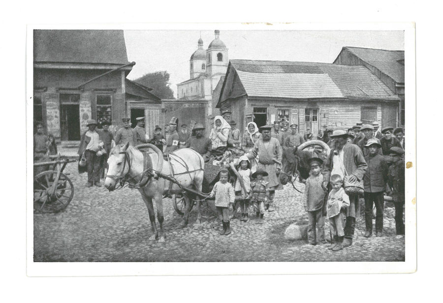 Soldiers with family in a market